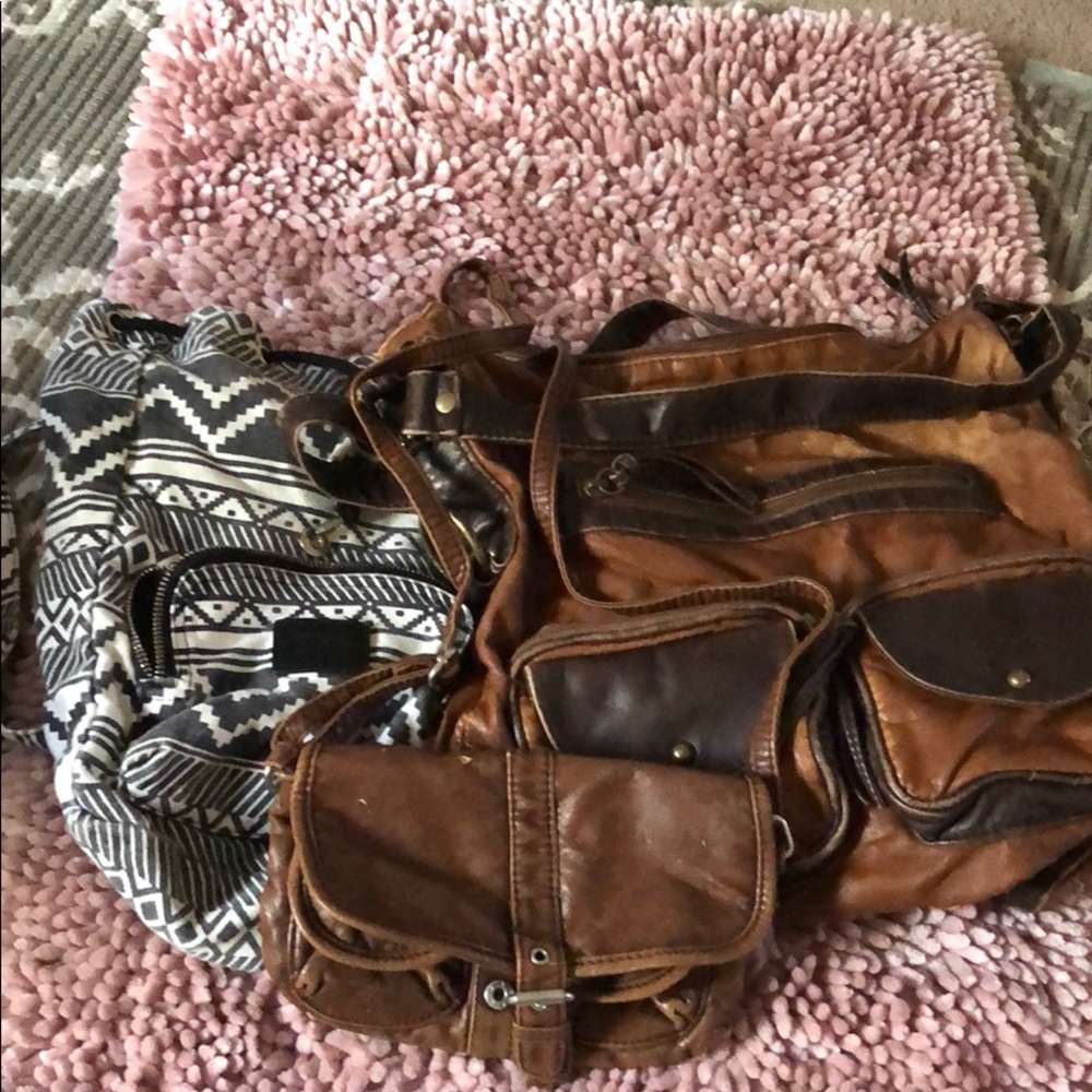 3 purses. Black and white is a mini vs backpack.